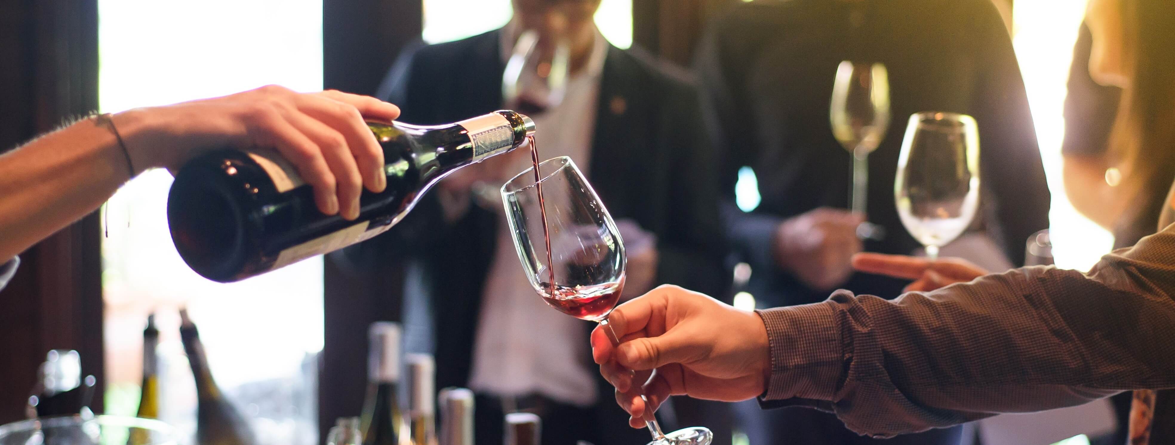 poring a glass of wine 